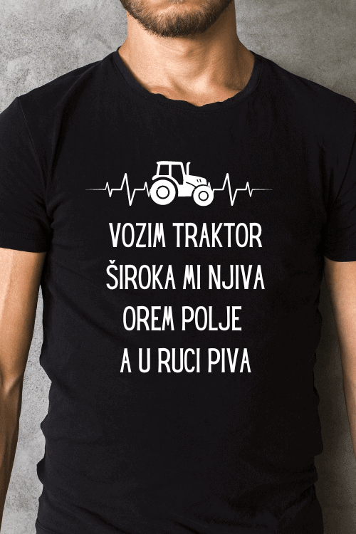 Vozim traktor široka mi njiva